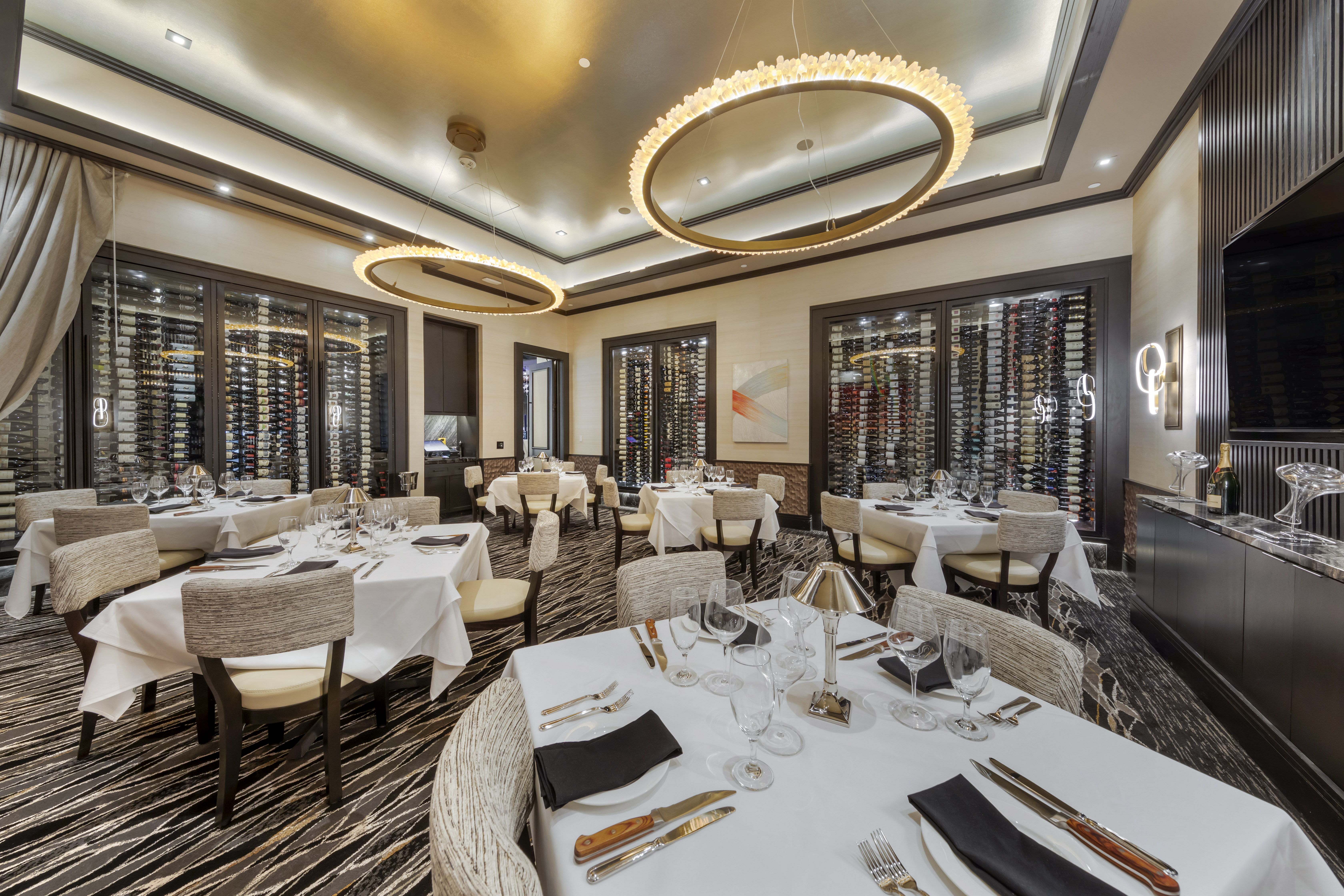 a living room filled with furniture and a large window