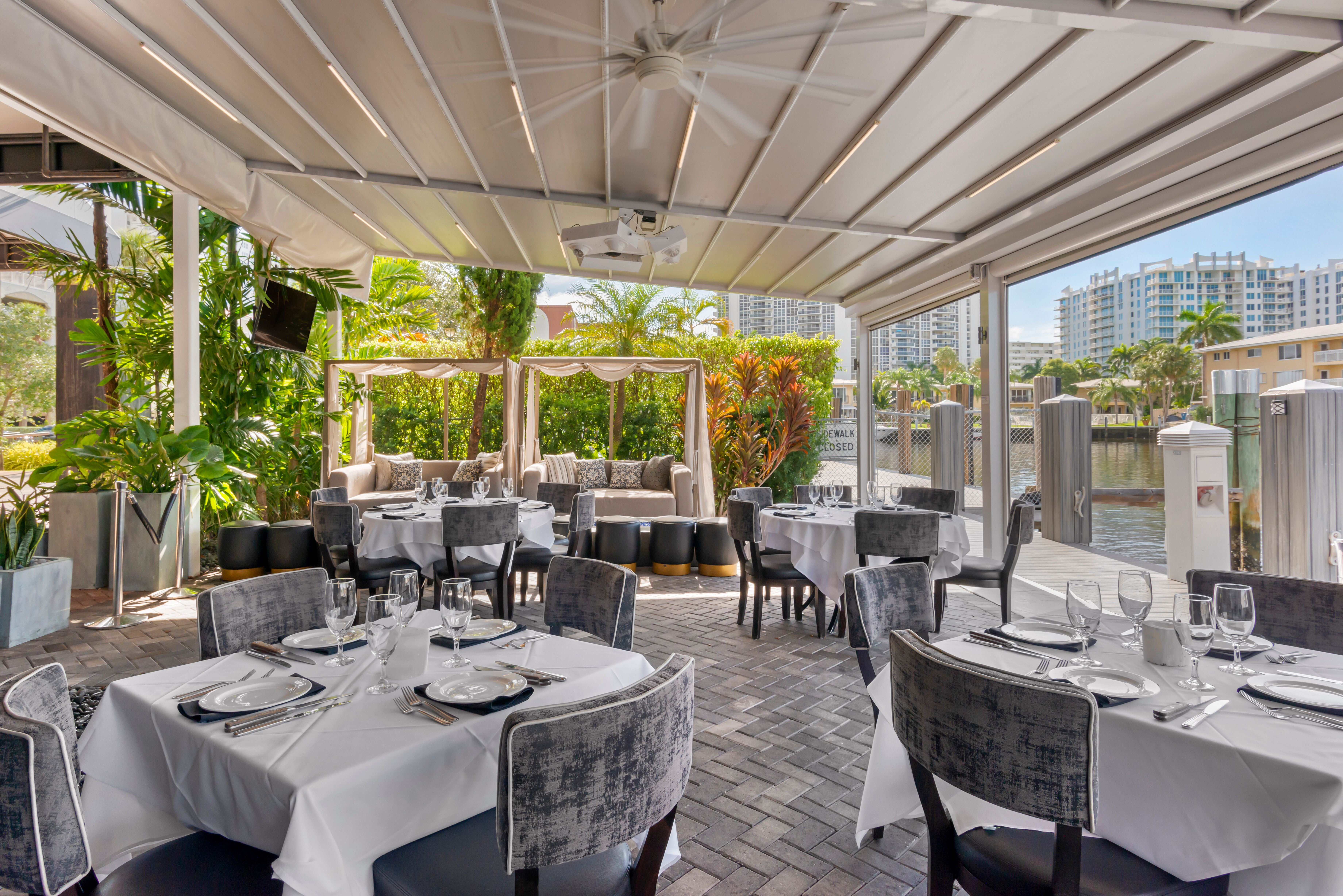 a large room with tables and chairs