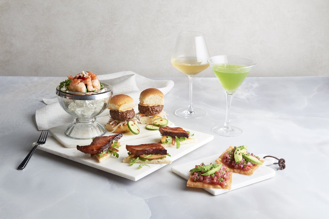 a table topped with plates of food on a plate