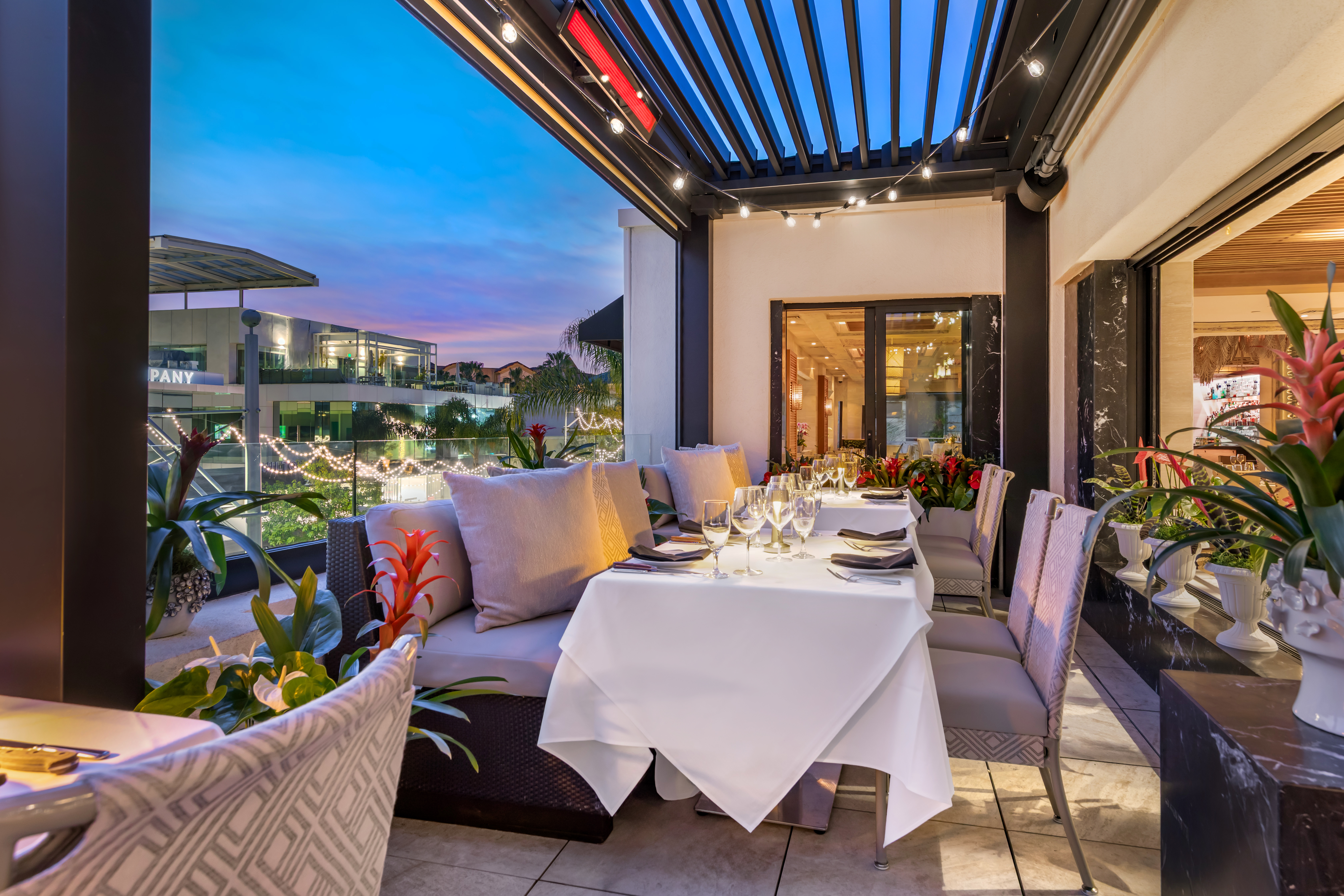 a room filled with furniture and a large window