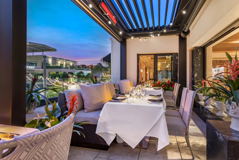 a room filled with furniture and a large window