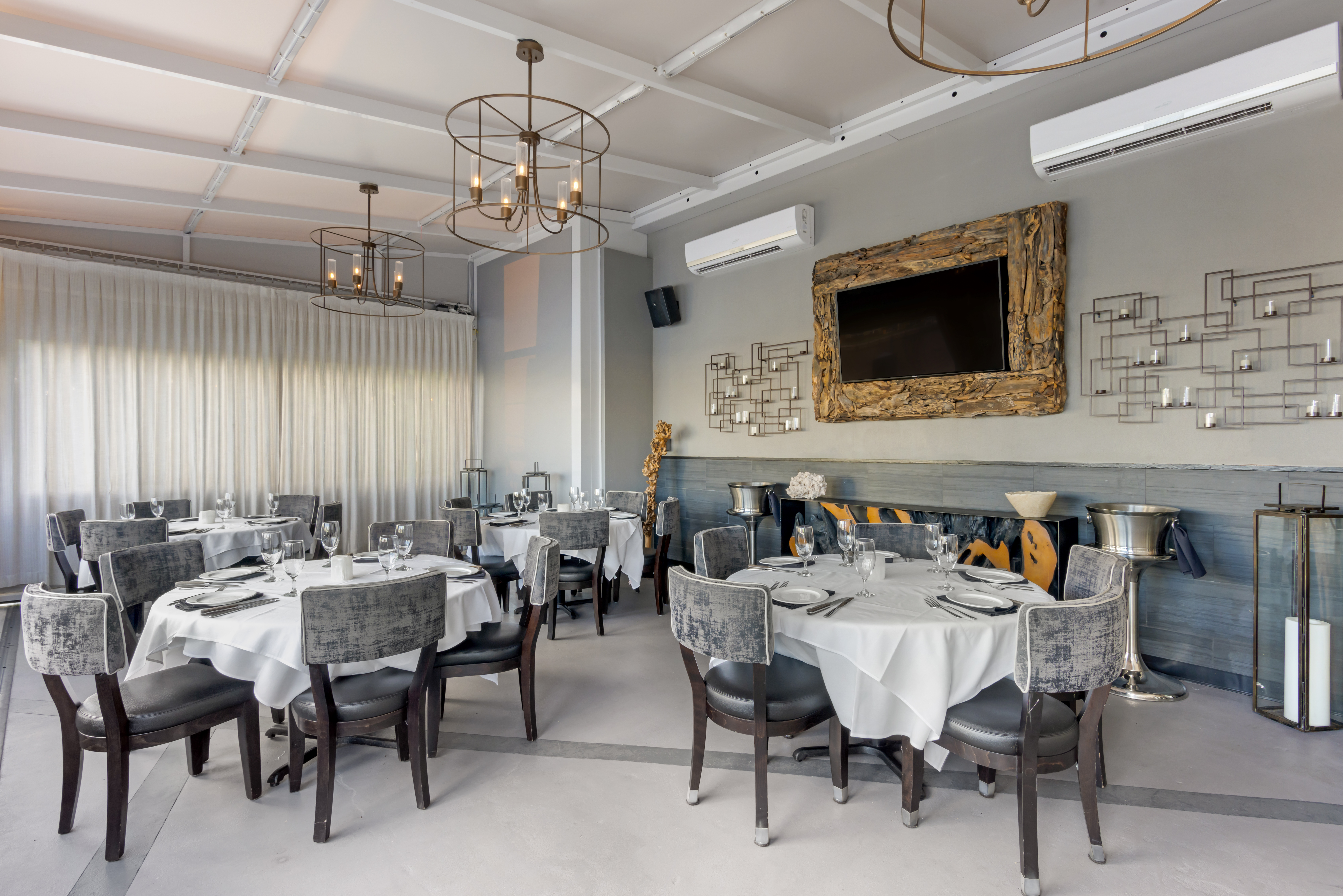 a large room with tables and chairs