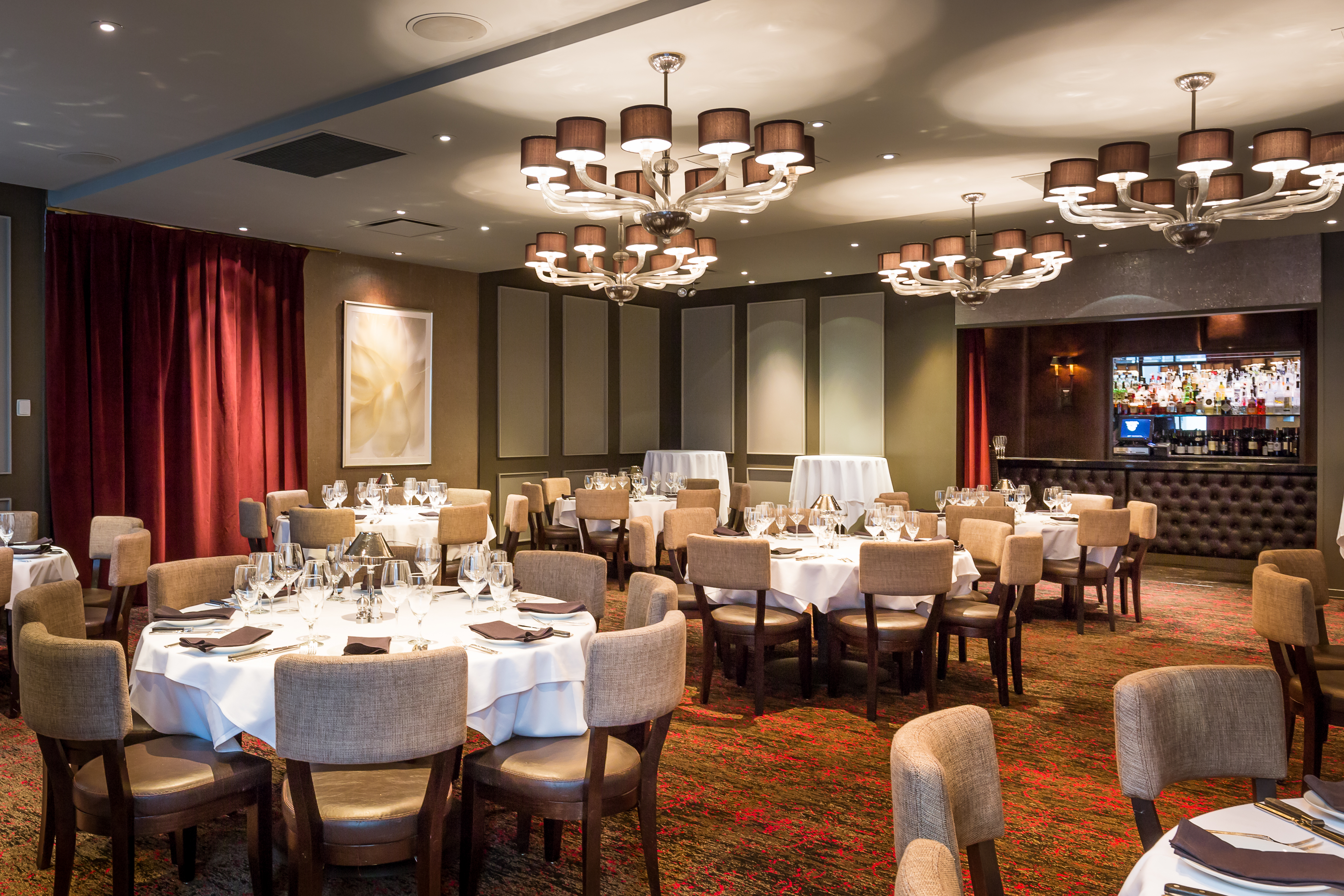 a room filled with furniture and a large window