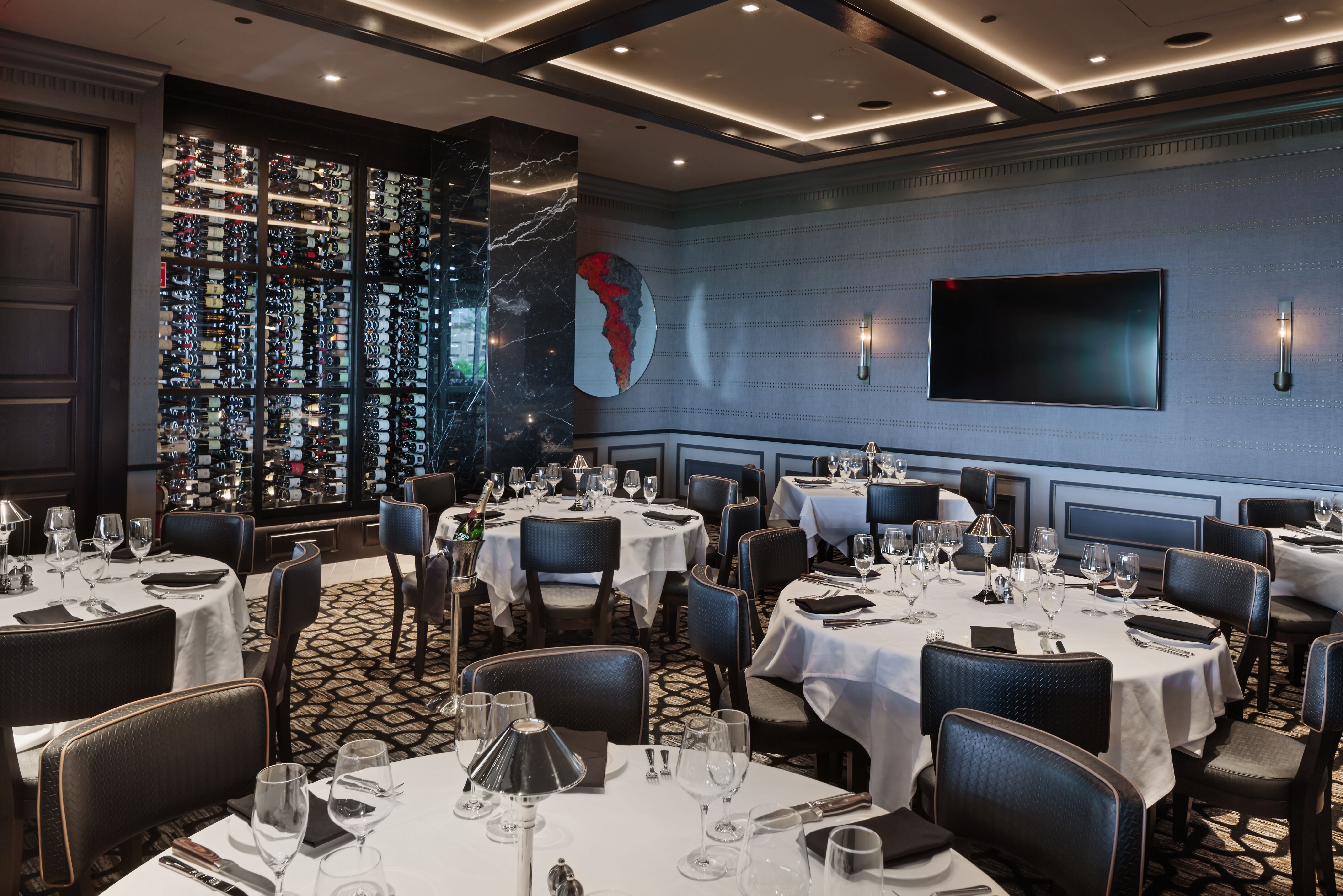 a dining room table in front of a building