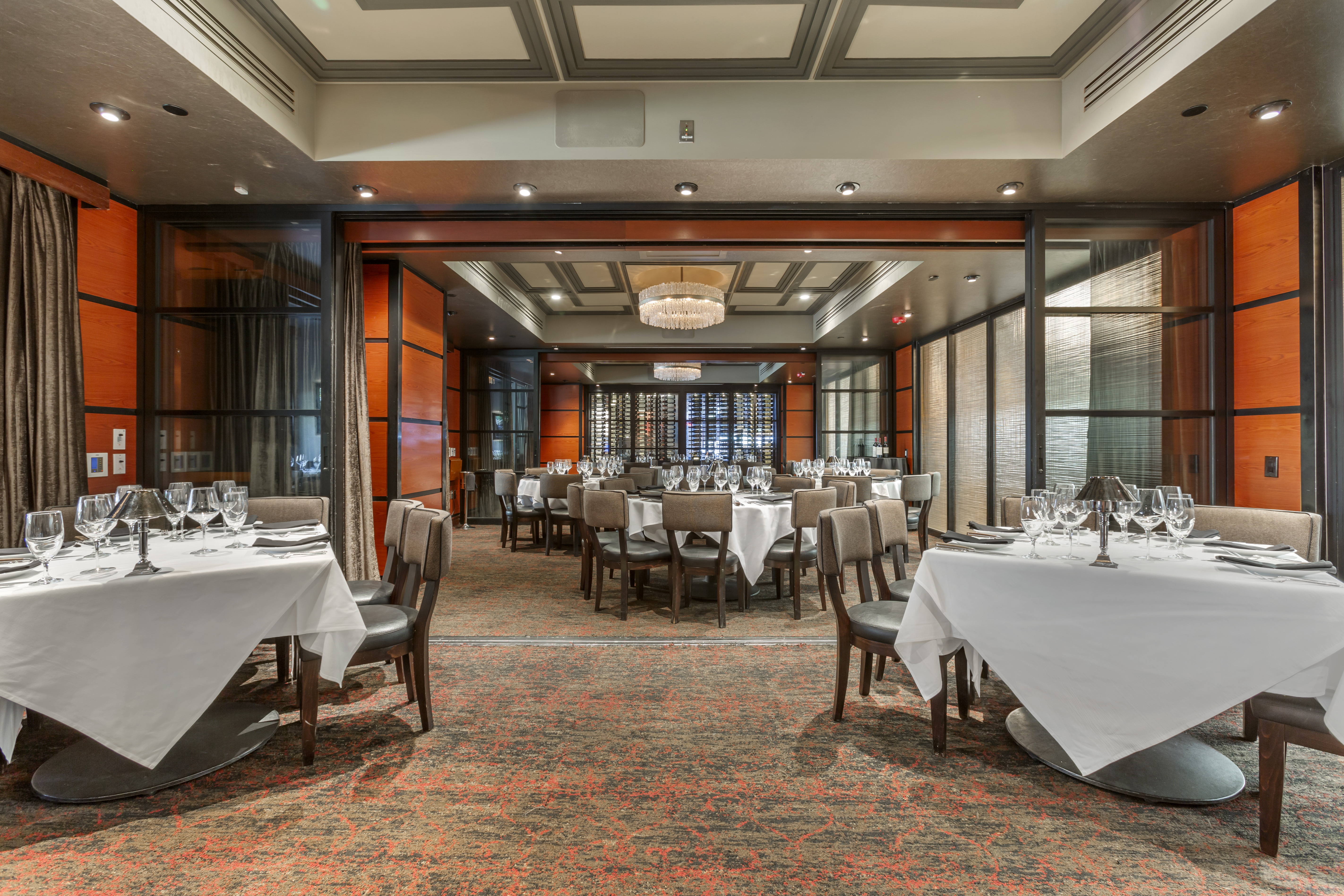 a room filled with furniture and a large window