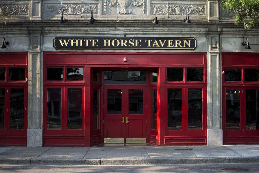 a store front with a red brick building