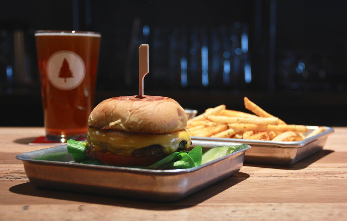 a sandwich sitting on top of a wooden table