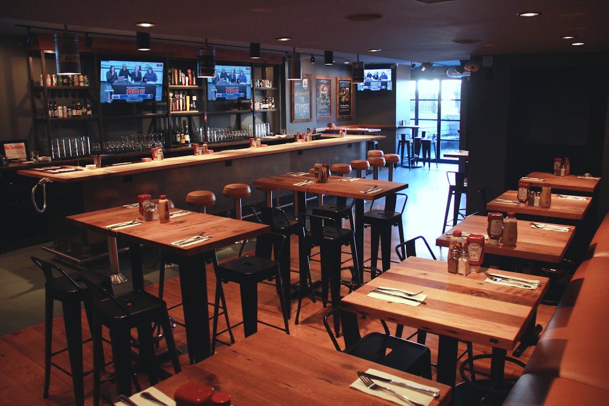 a room filled with furniture and a table in a restaurant