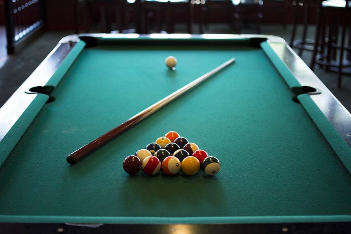 a table topped with a blue ball