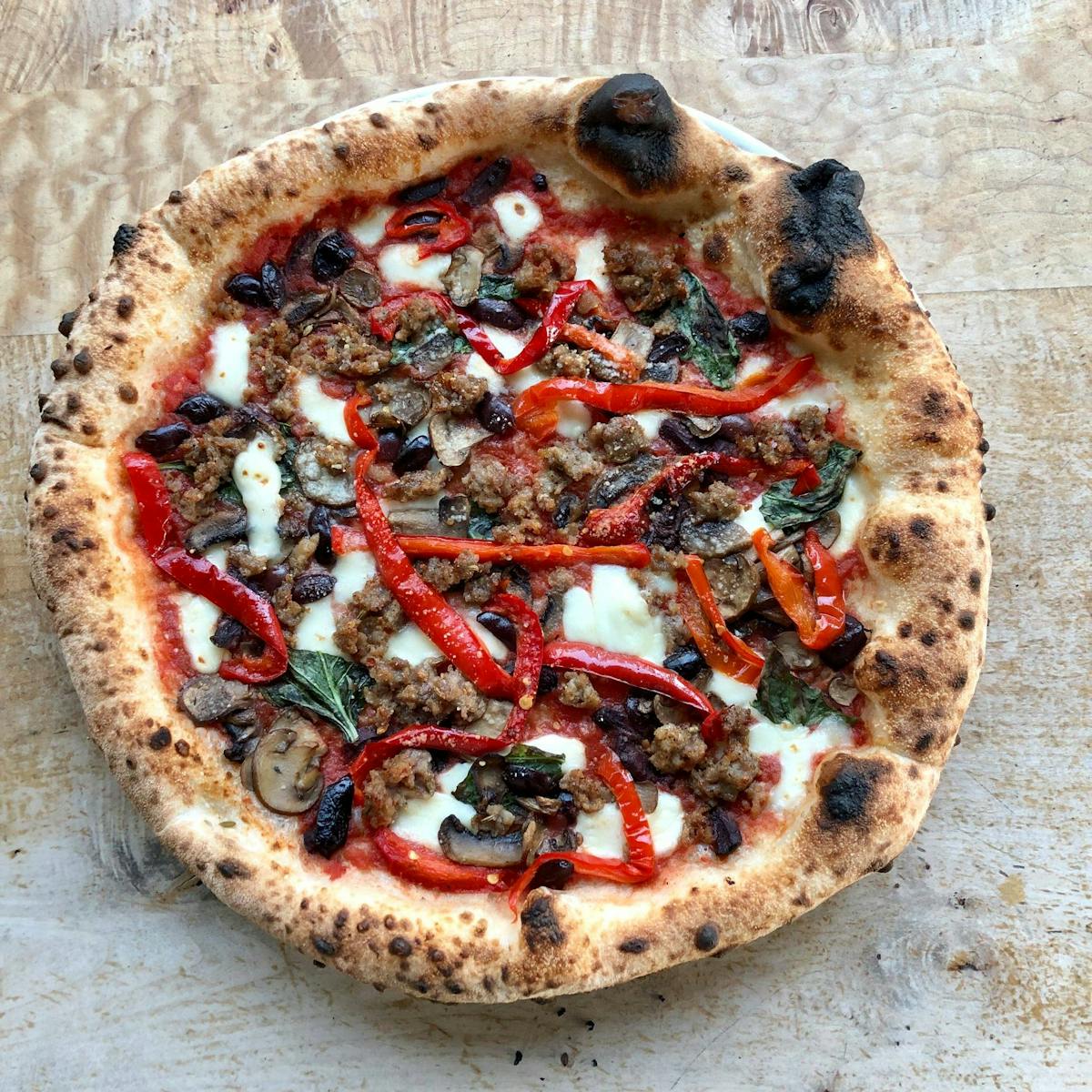 a pizza sitting on top of a table