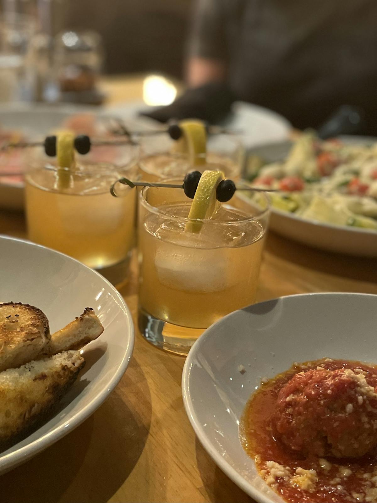 a bowl of food on a plate on a table