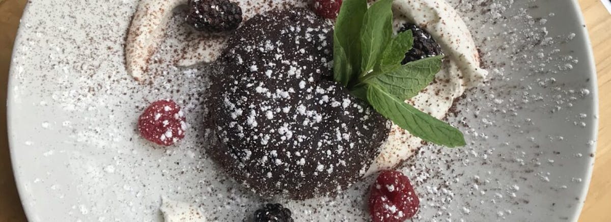 a close up of a plate covered with chocolate