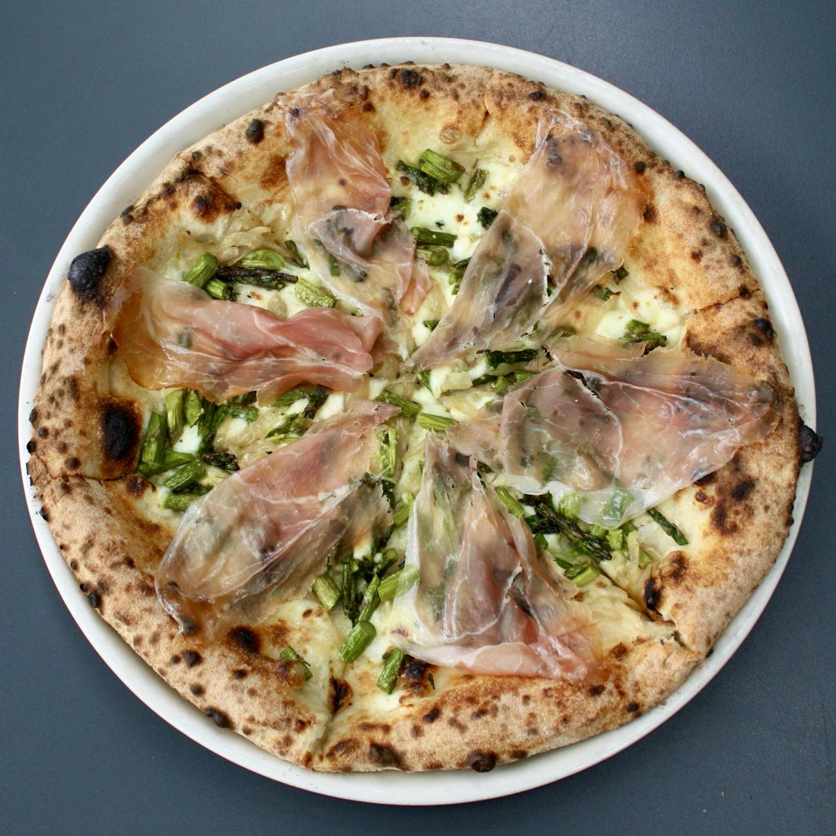 a slice of pizza on a plate