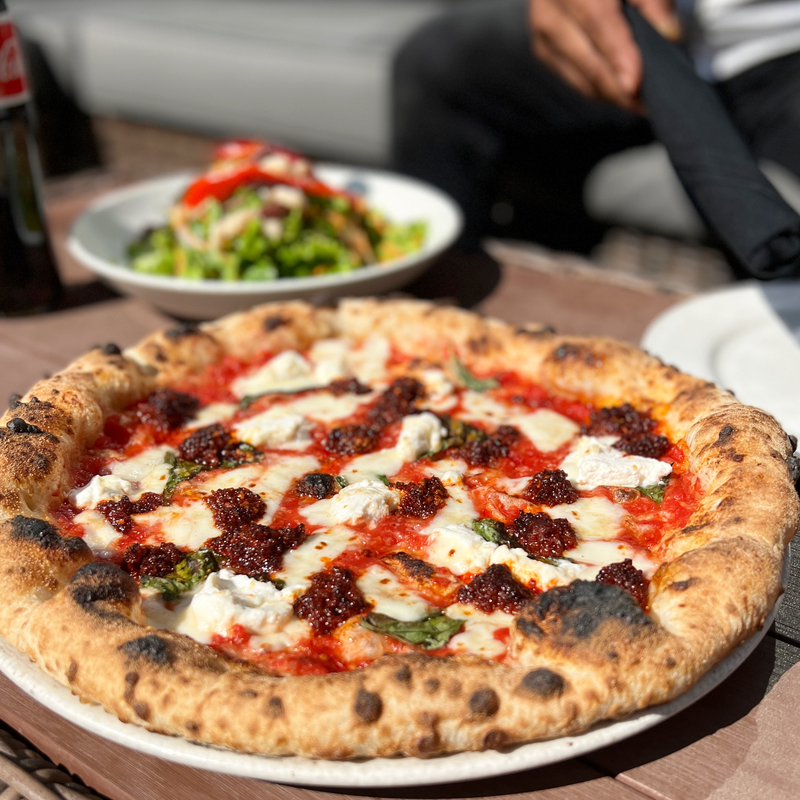 a pizza sitting on top of a table