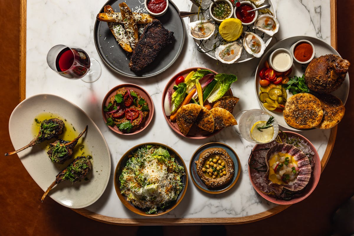 a table topped with different types of food on a plate