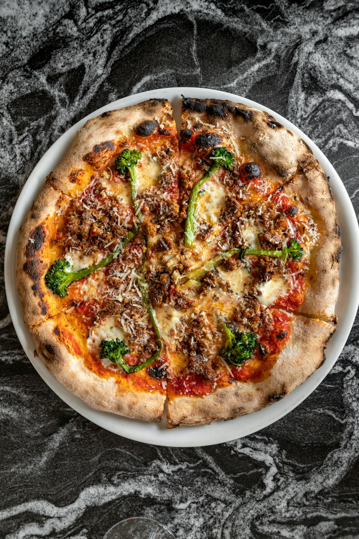 a pizza sitting on top of a table