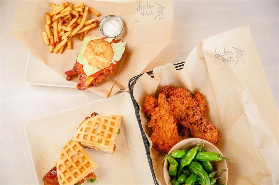 a box filled with different types of food on a plate