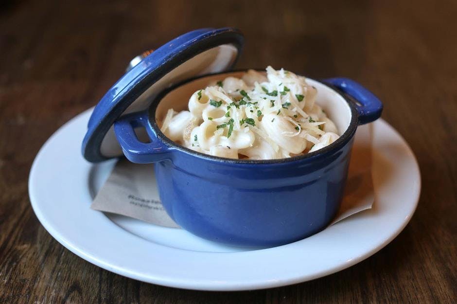 a plate of food and a cup of coffee