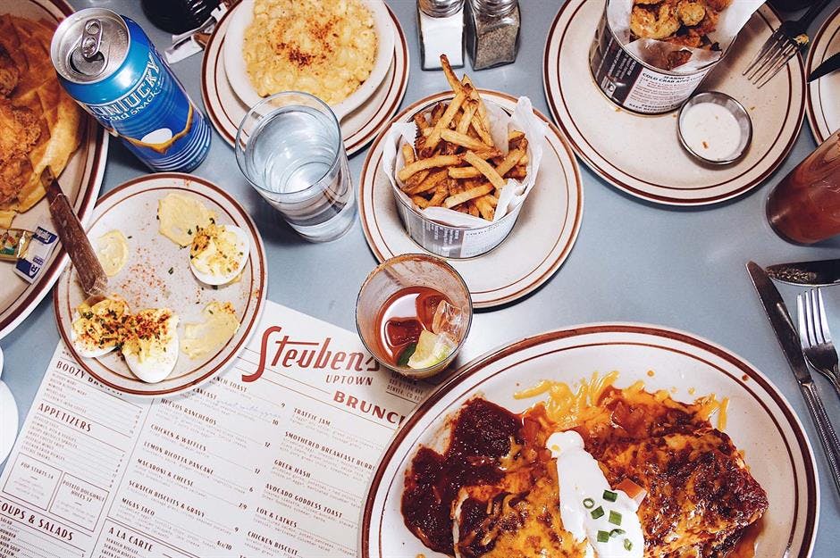 a table topped with plates of food on a plate