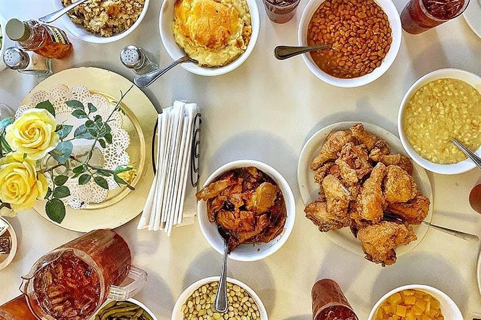 a bowl filled with different types of food on a plate