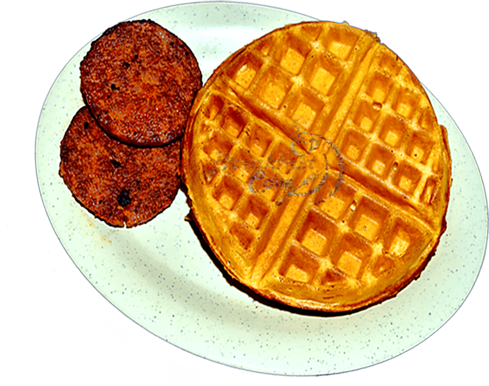 a plate of food with a slice of orange