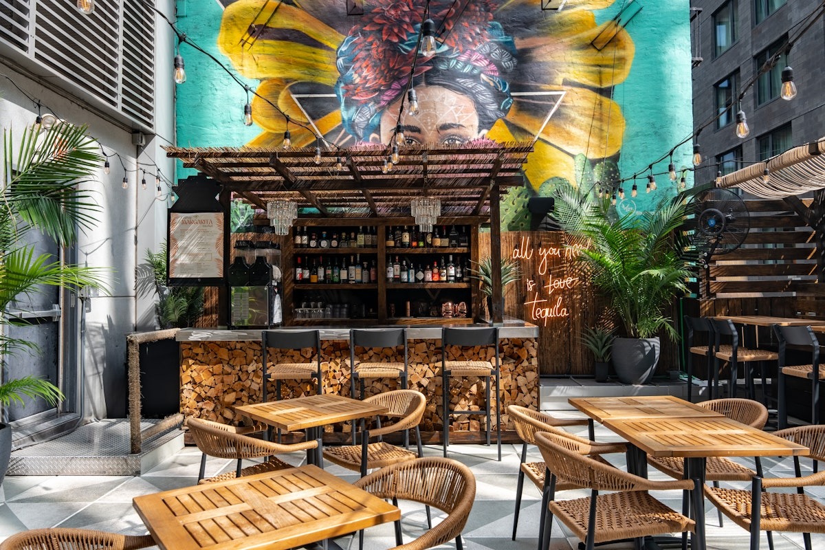 a dining room table in front of a building