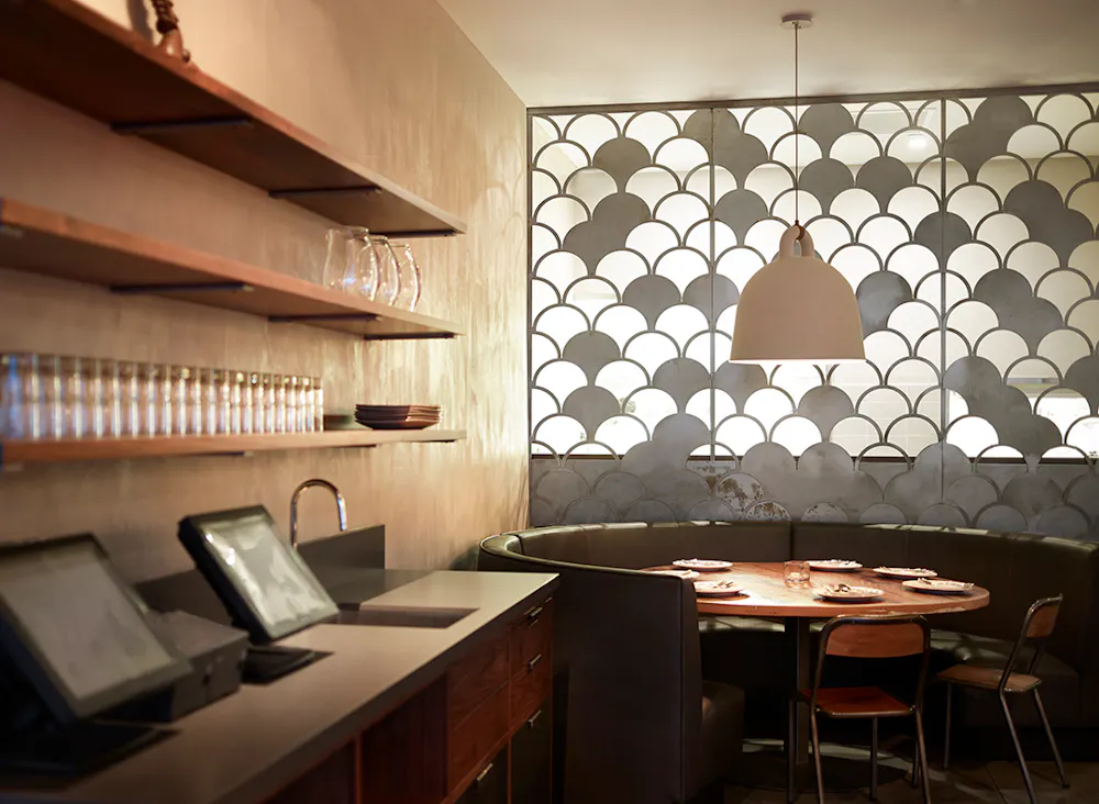 a kitchen with a table in a room
