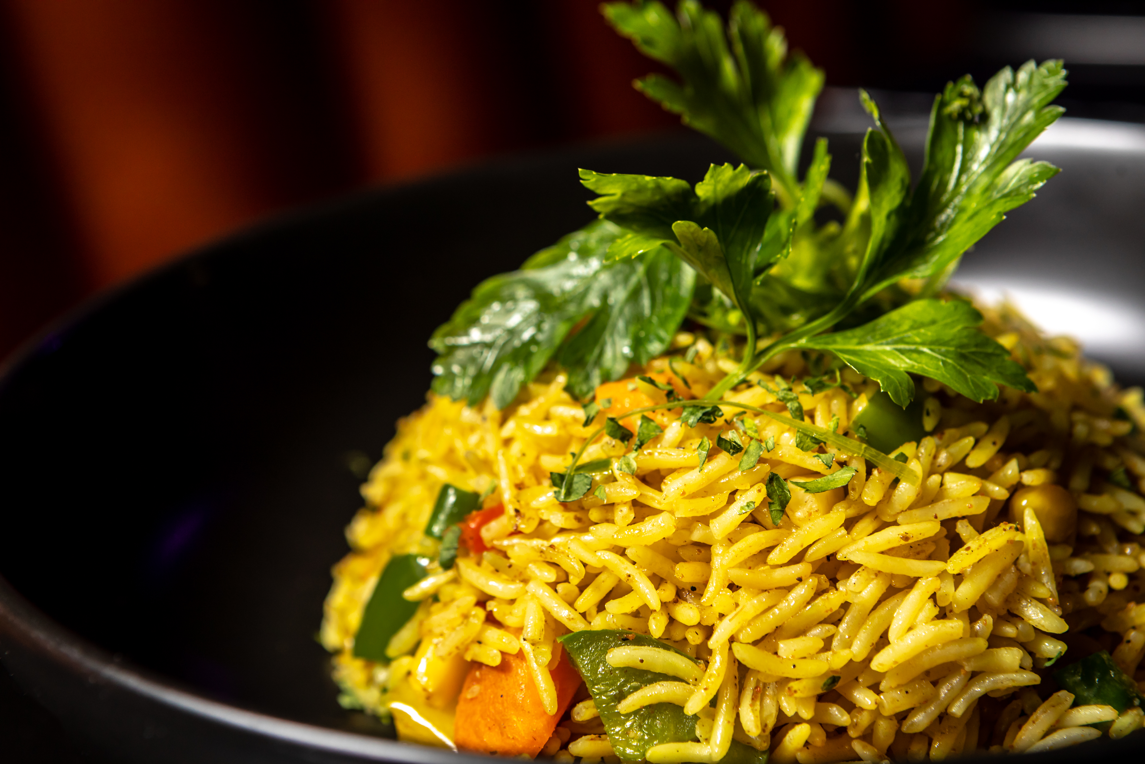 a bowl of food with broccoli