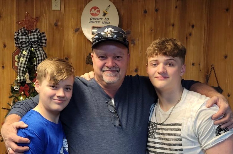 a group of people posing for the camera