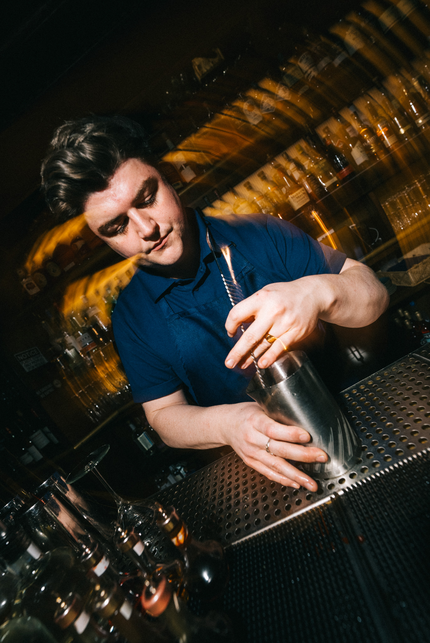 a close up of a bartender