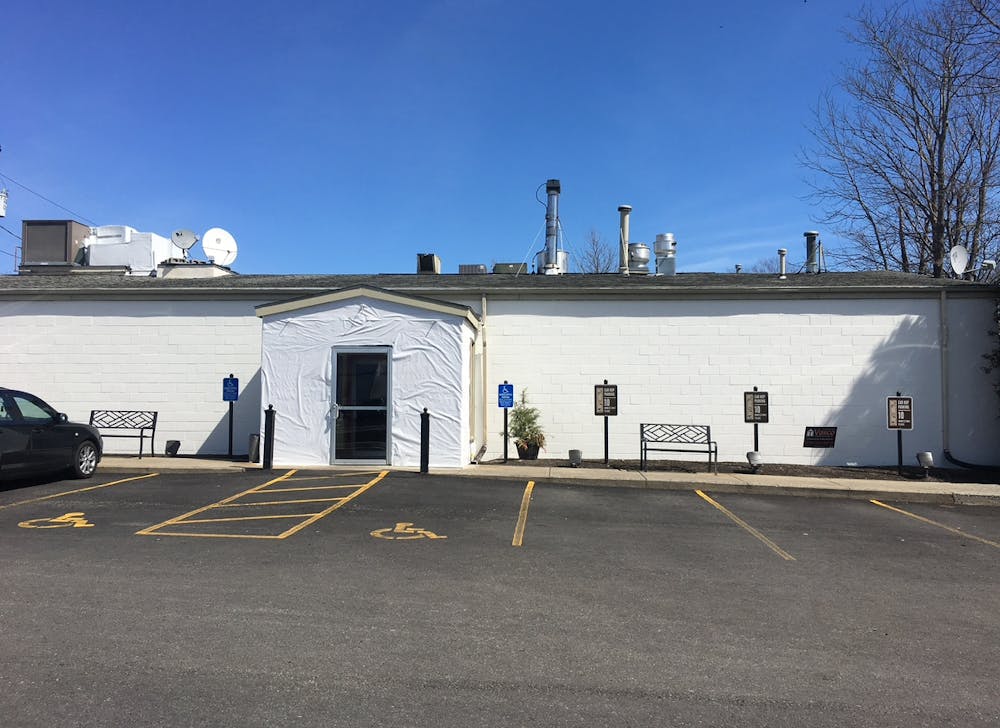 a person standing in a parking lot